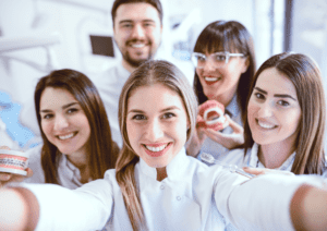 Group of Dentists Students Make Selfie in Clinic